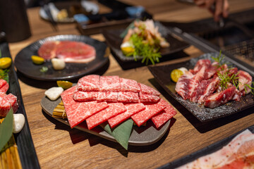 Slice of fresh beef meat in Japanese grill restaurant