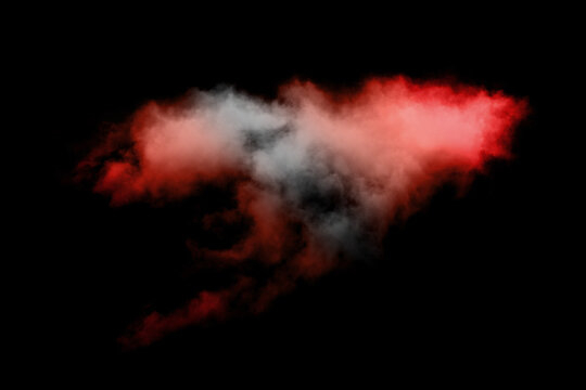 movement of red smoke abstract on black background ink beautiful.