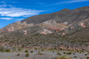Scenic drive from Cachi to Salta - beautiful landscape with colorful mountains around the Los Cardones National Park in Argentina, South America