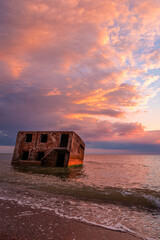Beautiful and colorful sunset over the Northern forts in the Baltic sea coastline at Karosta (Liepaja, Latvia)