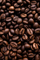 A close-up of roasted coffee beans can be used as a background for your coffee project