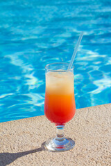 Glass of Cocktail with fruit juice outdoor
