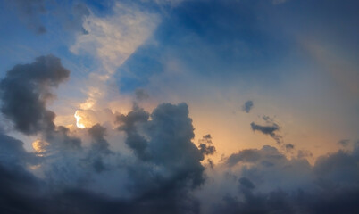 Cloudy sky background on the edge of a storm near sunset