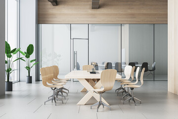 Modern contemporary meeting room interior with table and chairs, decorative plant in pots. 3D Rendering.