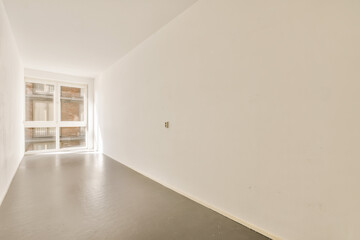 Fototapeta premium an empty room with no one on the wall or floor to see if it's not in use yet