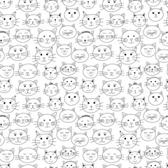 Obraz premium Doodle cat faces seamless pattern. Different cats vector pattern