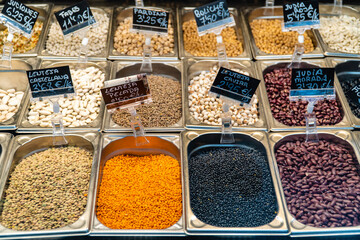 Assorted legumes in a store window.