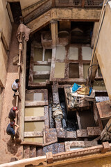 Fototapeta na wymiar Famous tannery in the medina of Fes, where leather is being processed for generations