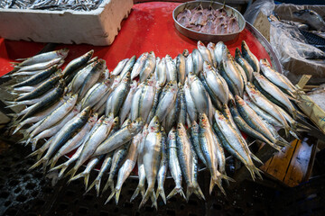 Fresh fish sale on the market stall.