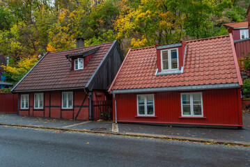 Fototapeta na wymiar Wooden colorful small houses on Damstredet Street in Oslo, Norway