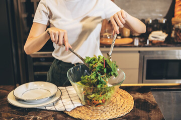 Close up of housewife is preparing ingredient to mixing fresh ve
