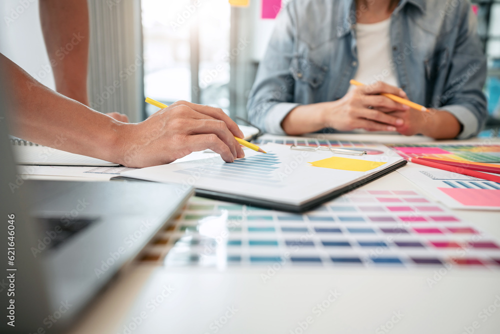 Poster team of creative graphic designer working on color swatch sample