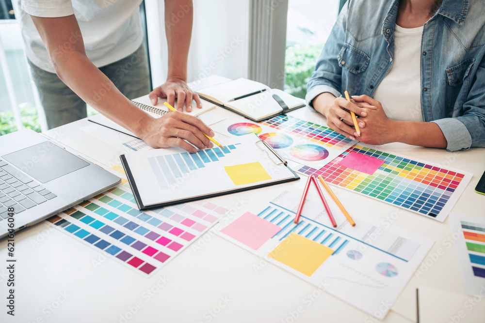 Poster two creative graphic designer team working on color selection an