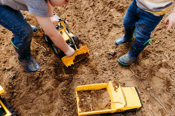 Little boys playing in the dirt