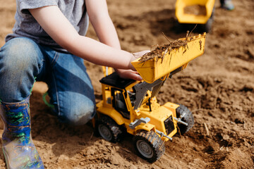 Little boys playing in the dirt © RaeofLifePhotography