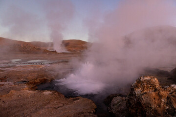Exploring the fascinating geothermic fields of El Tatio with its steaming geysers and hot pools high up in the Atacama desert in Chile, South America
