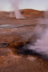 Exploring the fascinating geothermic fields of El Tatio with its steaming geysers and hot pools high up in the Atacama desert in Chile, South America
