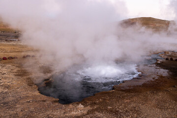 Exploring the fascinating geothermic fields of El Tatio with its steaming geysers and hot pools high up in the Atacama desert in Chile, South America
