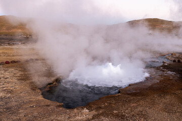 Exploring the fascinating geothermic fields of El Tatio with its steaming geysers and hot pools high up in the Atacama desert in Chile, South America
