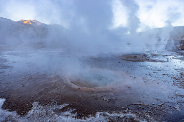 Exploring the fascinating geothermic fields of El Tatio with its steaming geysers and hot pools high up in the Atacama desert in Chile, South America