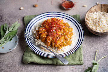 Chicken in curry sauce served in bowl