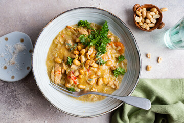 Chicken in curry sauce served in bowl