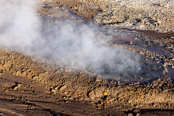 Exploring the fascinating geothermic fields of El Tatio with its steaming geysers and hot pools high up in the Atacama desert in Chile, South America