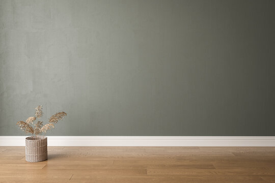 Blank dark green wall in house with dry plant in wooden basket pot, baseboard on wooden parquet in sunlight for luxury interior design decoration, home appliance product background.3D Rendering