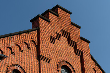 restored brick facade of an industrial building from the end of the 19th century in cologne...