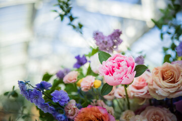 Obraz na płótnie Canvas Beautiful Garden Botanical Wedding Ceremony Reception Vibrant Flower Flowers Event Events Centerpiece Glass Candle Table Setting