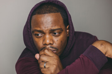 Young african american man looking sad and depressed