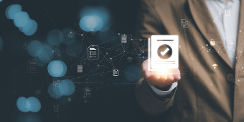 Accountant showing office document auditing concept ,plan review process and assess correctness ,Management of important document storage of organization ,document system ,accountant Audit documents