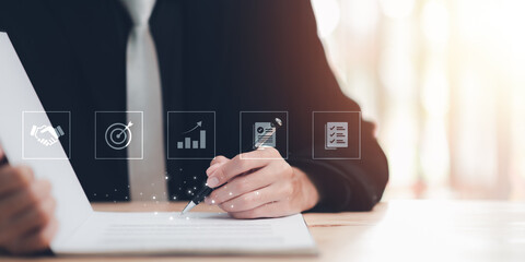 Businessman validates and manages business documents and agreements ,business contract signing...