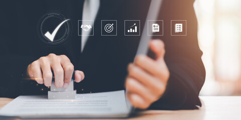 Businessman validates and manages business documents and agreements ,business contract signing ,contract approval ,contract documents confirmation ,joint venture agreement ,Signing a form
