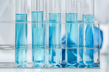 medicine research in chemical laboratory, chemist scientist working with liquid experiment test analysis by using scientific tube beaker glassware, chemistry science pharmaceutical medical lab concept