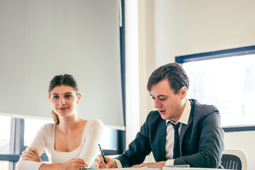 Business analyst team using laptop for financial insight with Fintech paper for data analysis dashboard. Creative and analytic brainstorming for marketing plan strategy system idea. Prodigy teamwork