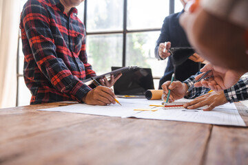 Factory Meeting Room of architect engineer meeting at working desk of blueprints construction concept. Engineer people concept