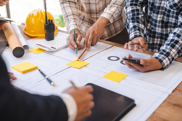 Factory Meeting Room of architect engineer meeting at working desk of blueprints construction concept. Engineer people concept