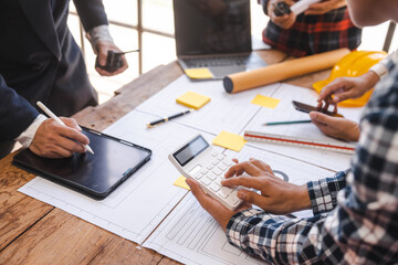 Factory Meeting Room of architect engineer meeting at working desk of blueprints construction concept. Engineer people concept