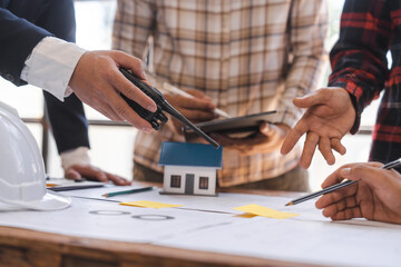 Factory Meeting Room of architect engineer meeting at working desk of blueprints construction concept. Engineer people concept