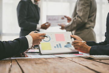 Group of business people doing bookkeeping, colleagues discussing, start planning, sharing ideas, working together in modern office. Meeting Teamwork successful business job interview ideas