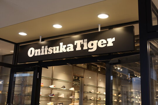 Onitsuka Tiger shop entrance at Mitsui Outlet Park Makuhari shopping mall in Makuhari, Chiba, Japan. January 25, 2023
