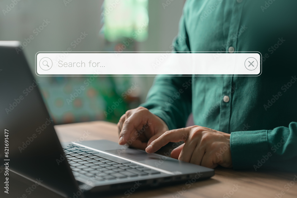 Aufkleber User working with a laptop computer on the table. Search engine optimization of the internet with the search bar. Best SEO technology networking, Searching browsing internet data information concept.