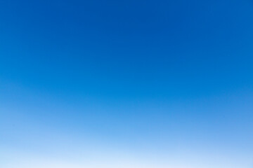 Background of a blue sky without clouds at dawn