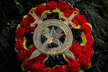 Funeral wreath on the grave of a soldier of PMC Wagner