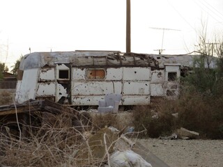 In Yard of Abandoned Old Mobile Home in Bombay Beach, California