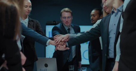 diverse businesspeople putting hands and shaking for luck an successful work, 4K, Prores