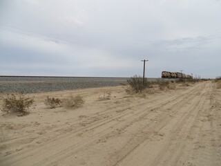 Far Away Freight Train Coming through the California Desert 