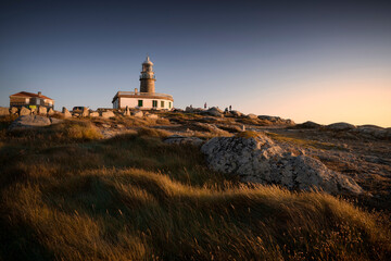 Corrubedo lighthouse at sunset in Galicia, Spain
