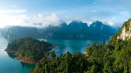 Aerial view at Khao Sok national park Cheow Lan Dam lake with blue sky background  in Surat Thani,...